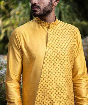 Mustard Embroidered Diagonal Cut Kurta With Pants. 3
