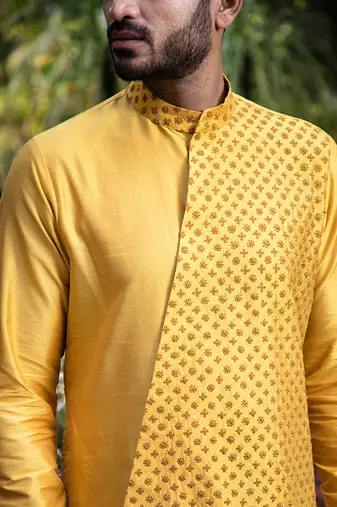 Mustard Embroidered Diagonal Cut Kurta With Pants.