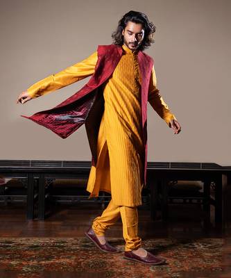 Honey Yellow Thin Pleats Kurta And Churidar. 1