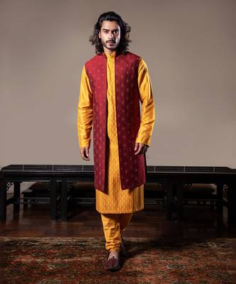 Honey Yellow Thin Pleats Kurta And Churidar With Maroon Embroidered Jacket. 1