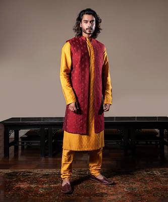 Honey Yellow Thin Pleats Kurta And Churidar With Maroon Embroidered Jacket. 2