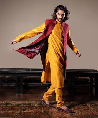 Honey Yellow Thin Pleats Kurta And Churidar With Maroon Embroidered Jacket. 3