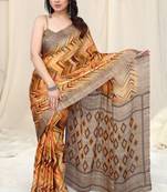 Mustard printed chiffon saree with blouse
