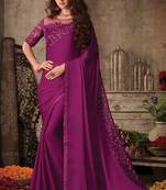 Magenta embroidered art silk saree with blouse