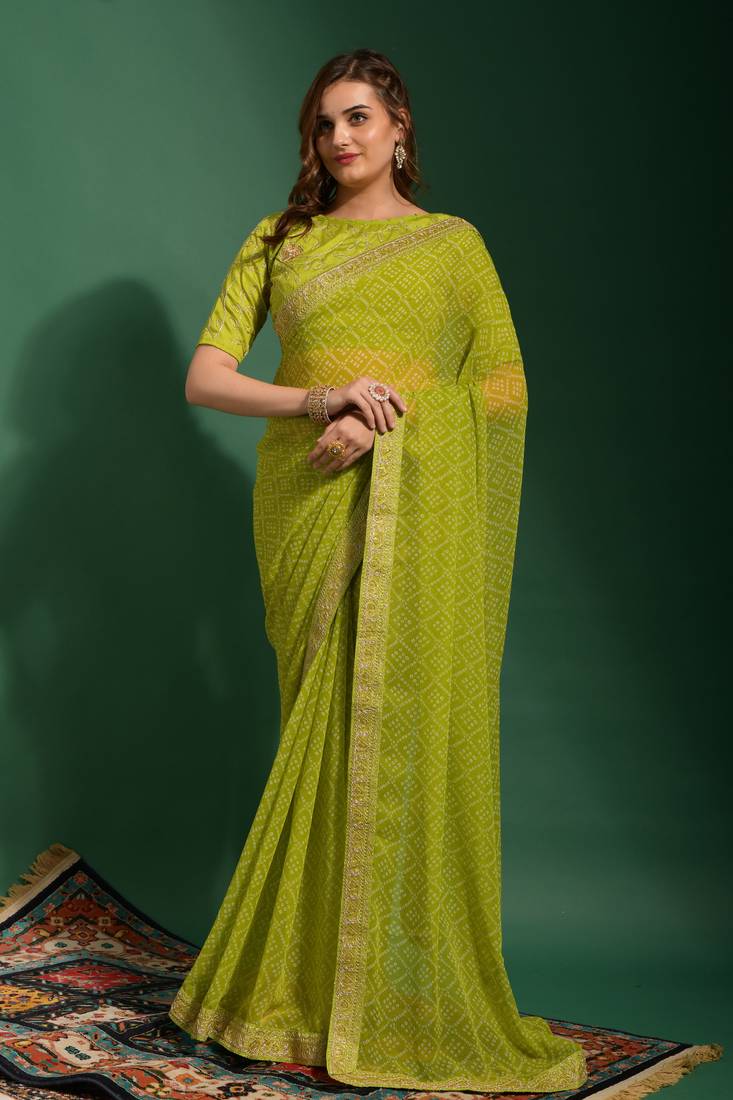 Green embroidered georgette saree with blouse