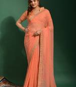 Peach Embroidered Georgette Saree With Blouse
