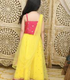 Yellow plain net stitched lehenga