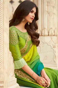 Green embroidered silk blend saree with blouse