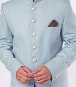 Sky blue bandhgala with welt pockets paired with solid pant