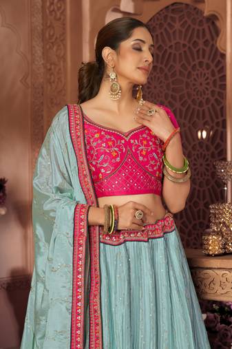 Turquoise embroidered
 silk semi stitched lehenga