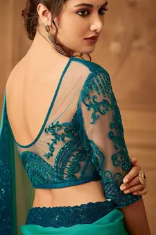 Green embroidered silk blend saree with blouse