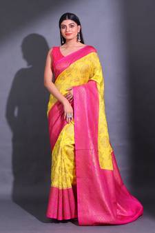 Yellow Dupion Silk Handwoven Saree With Zari Woven Texture And Floral Patterns