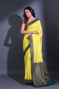 Yellow Dupion Silk Handwoven Saree With Zari Woven Texture And Floral Patterns