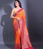 Orange Dupion Silk Handwoven Saree With Zari Woven Texture And Floral Patterns