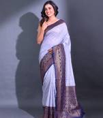 Grey Dupion Silk Handwoven Saree With Zari Woven Texture And Floral Patterns