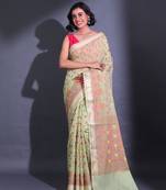 Tea Green Cotton Blend Handwoven Saree With Zari Woven Floral Designs