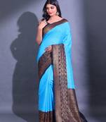 Sky Blue Dupion Silk Handwoven Saree With Zari Woven Texture And Floral Patterns