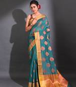 Teal Cotton Handwoven Saree With Nakshi Pattern And Floral Borders