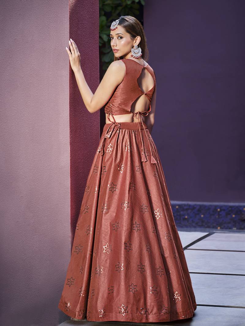 RUST ORANGE SEQUINS EMBROIDERED ART SILK FESTIVE & PARTY WEAR SEMI STITCHED LEHENGA & SHRUG