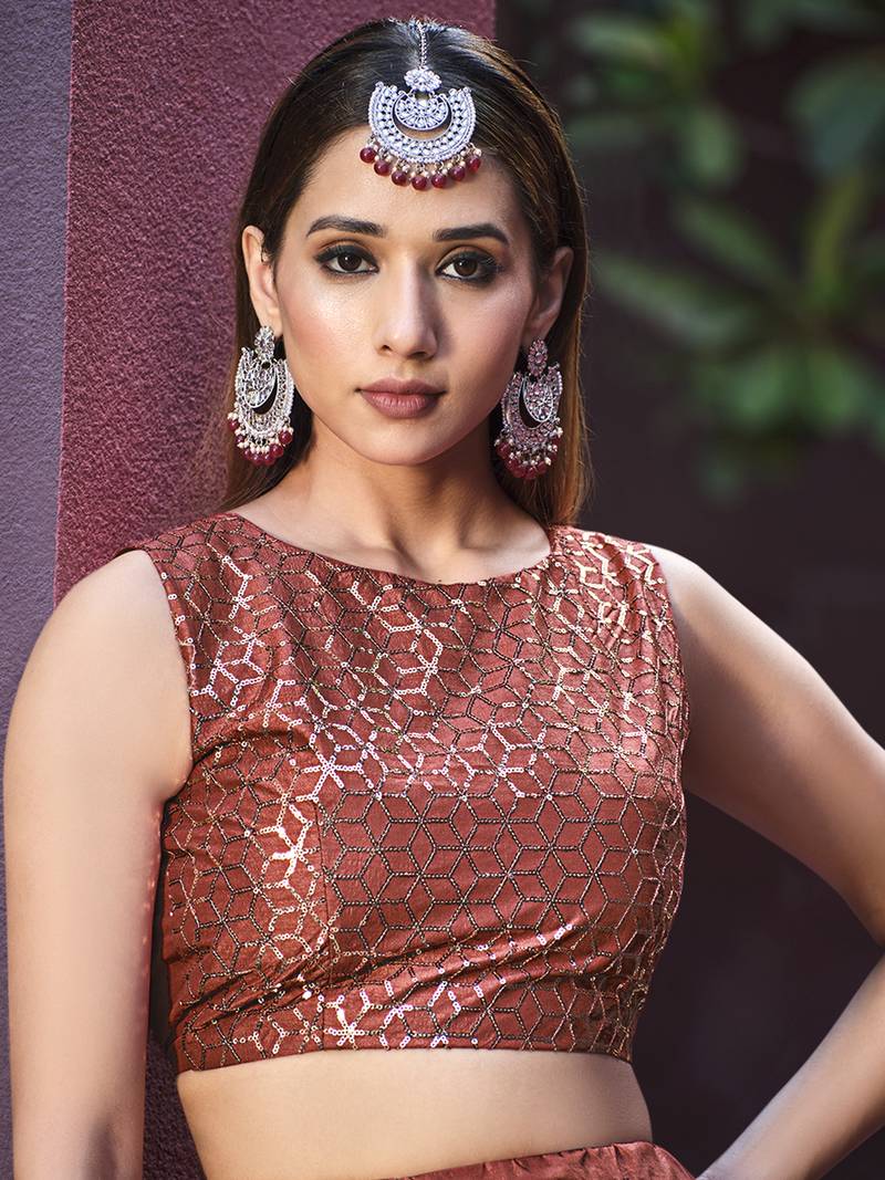 RUST ORANGE SEQUINS EMBROIDERED ART SILK FESTIVE & PARTY WEAR SEMI STITCHED LEHENGA & SHRUG