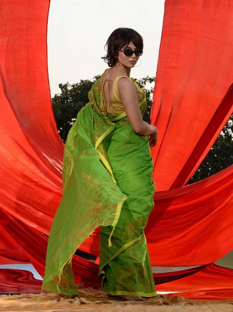 Green Cotton Blend Handwoven Saree With Geometric Motifs And Zari Stripes