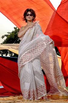 White Cotton Blend Handwoven Saree With Geometric Motifs And Zari Stripes