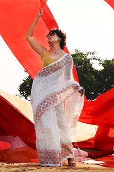 White Cotton Blend Handwoven Saree With Geometric Motifs And Zari Stripes
