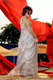 White Cotton Blend Handwoven Saree With Geometric Motifs And Zari Stripes