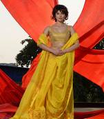 Yellow Cotton Blend Handwoven Saree With Geometric Motifs And Zari Stripes