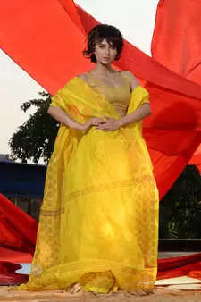 Yellow Cotton Blend Handwoven Saree With Geometric Motifs And Zari Stripes