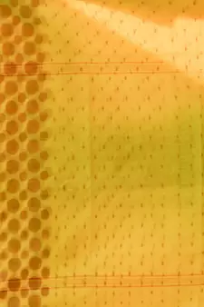Yellow Cotton Blend Handwoven Saree With Geometric Motifs And Zari Stripes