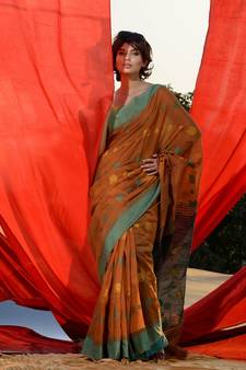 Tawny Brown Cotton Handspun Saree With Woven Floral Motifs