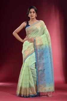 Tea Green Blended Cotton Handwoven Saree With Woven Zari Paisley And Floral Designs
