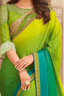 Green embroidered silk blend saree with blouse