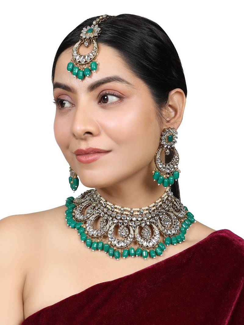 Traditional Gold Plated Green Colored Kundan and Pearl Studded Bridal Necklace Set with Earring and Maangtikka