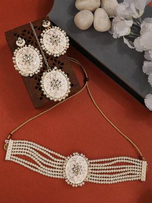 Traditonal Gold Plated Enameled White Colored Oval Shaped Pearl Layeed Choker Set with Earrings and Maangtikka Set 1