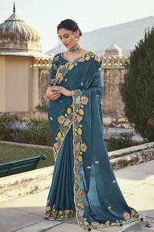 Teal embroidered silk saree with blouse