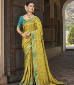 Olive embroidered silk saree with blouse