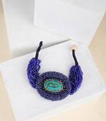 Contemporary Blue colored Beads studded Oval shaped Bracelet for Women and Girls.