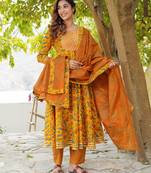 Women Mustard Cotton Kurta with Trousers And Dupatta Set