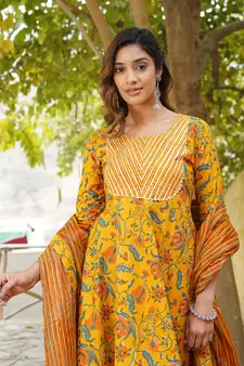 Women Mustard Cotton Kurta with Trousers And Dupatta Set
