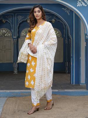 Women Yellow Cotton Kurta with Trousers And Dupatta Set 1