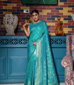 Dark green woven paithani silk saree with blouse