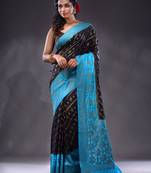 Black Dupion Silk Handwoven Saree With Zari Woven Texture And Ethnic Patterns