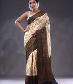 White Dupion Silk Handwoven Saree With Zari Woven Texture And Floral Patterns