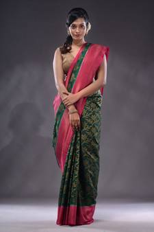 Emerald Green Dupion Silk Handwoven Saree With Zari Woven Texture And Floral Patterns