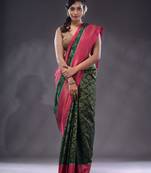 Emerald Green Dupion Silk Handwoven Saree With Zari Woven Texture And Floral Patterns
