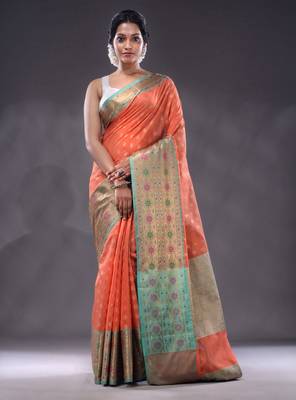 Salmon Orange Cotton Blend Handwoven Saree With Zari Woven Texture And Floral Patterns 1