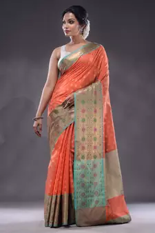 Salmon Orange Cotton Blend Handwoven Saree With Zari Woven Texture And Floral Patterns