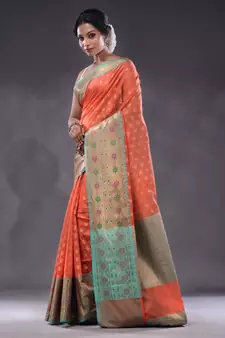 Salmon Orange Cotton Blend Handwoven Saree With Zari Woven Texture And Floral Patterns